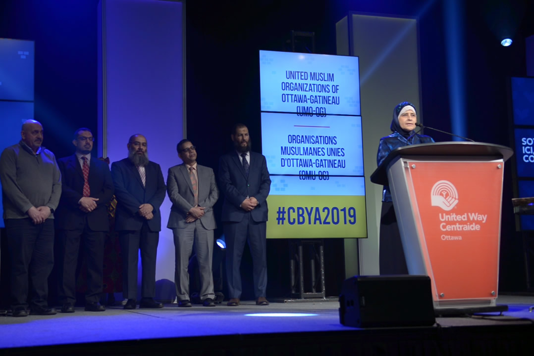 A photo of The United Muslim Organizations of Ottawa-Gatineau making a speech at the CBYA Gala.