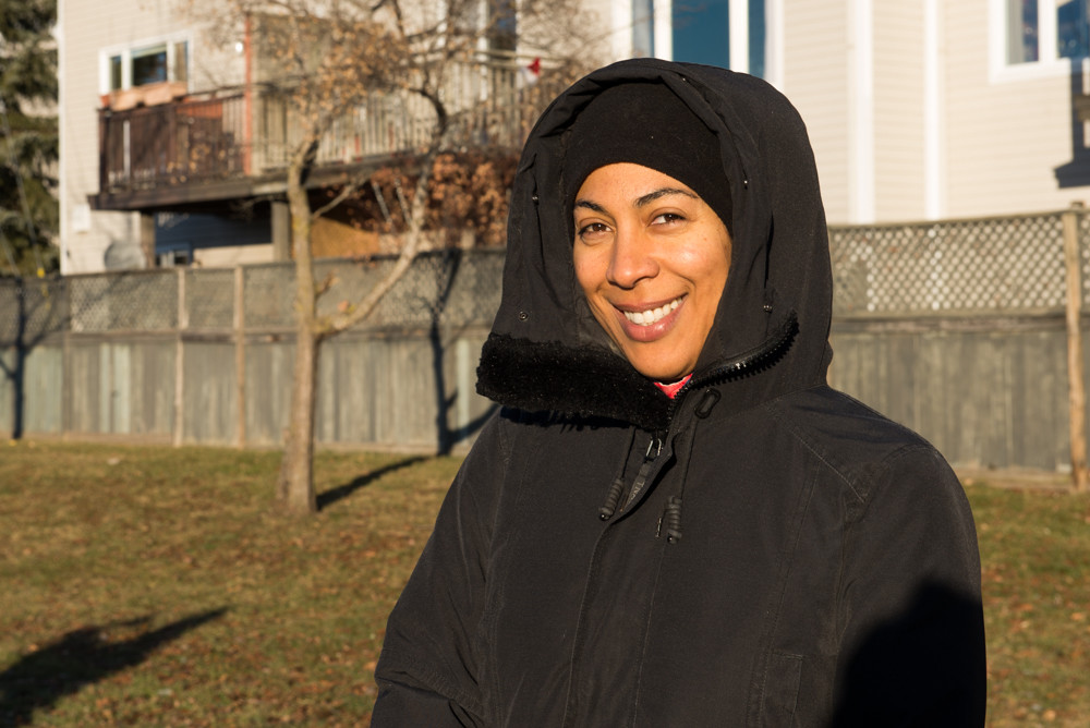 A photo of a Vanessa standing in a park.