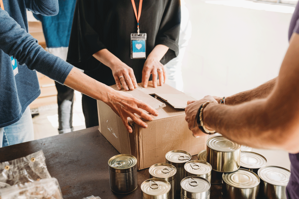 A photo of people providing food supplies to those in need.