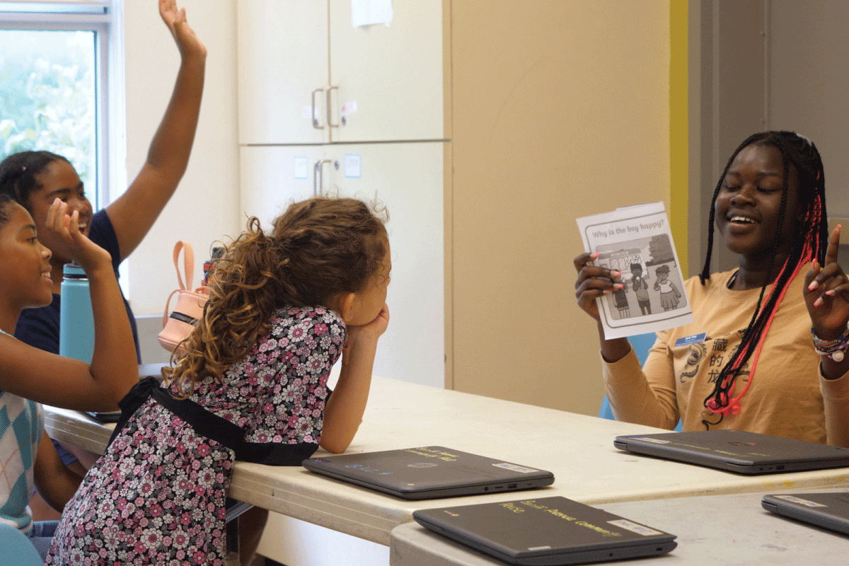 A photo of students in a school room setting.