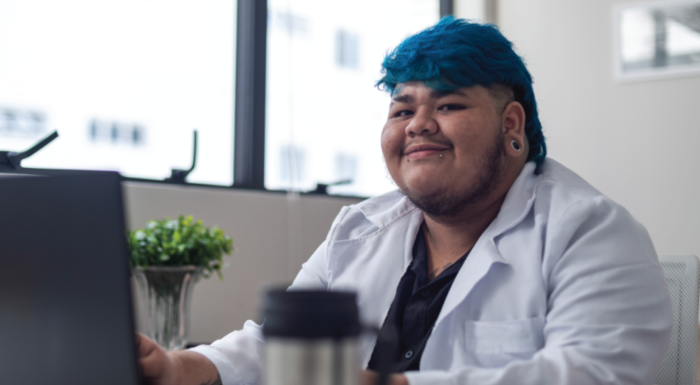 A photo of someone working hard at their office computer.